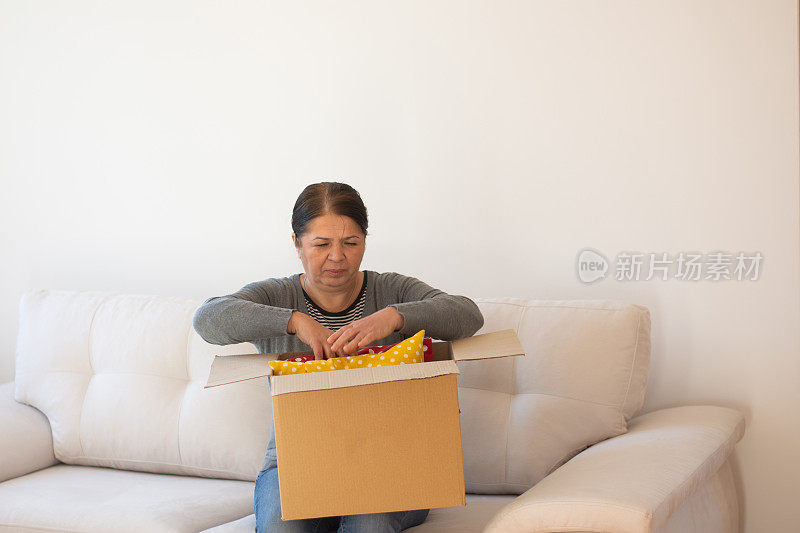 Excited young woman in new house